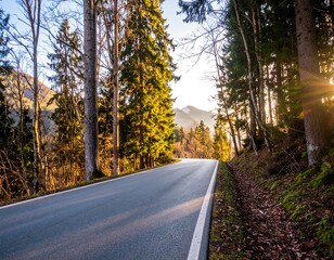 Fototapeta premium Winding mountain road at sunset