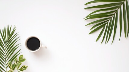 Minimalist white desk top view with coffee cup and plant leaves as visual focus, organized layout and copy space ideal for branding promotion and layout needs