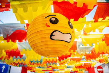Yellow paper ball with a human face from the paper flower festival organized by the town of Redondo-&Eacute;vora-Portugal
