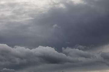Dark Storm Clouds Gathering in Dramatic Evening Sky 
