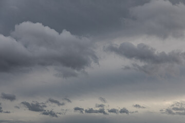 Layered Dark Clouds in Overcast Evening Sky 
