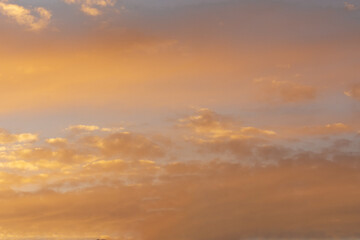 The amazing color of the evening sky and the pattern of clouds on it.