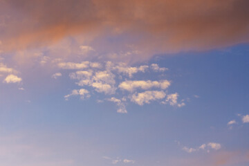 The amazing color of the evening sky and the pattern of clouds on it.