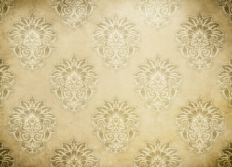 Grunge old paper background with decorative floral ornament.