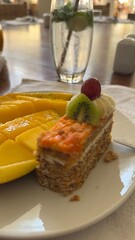 Bowl of fruit salad Delicious ripe mango fruit slices and cubes on plate for healthy eating and tropical dessert recipe Fresh fruit in a wooden bowl. Concept of healthy nutrition.