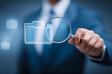 Business professional using a magnifying glass to analyze digital files and documents in a modern office environment in the evening