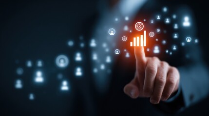 Fototapeta premium Finger touches glowing graph among people icons in network