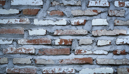 Old rustic red brick wall with white plaster texture - Dinding bata merah tua dengan tekstur plester putih