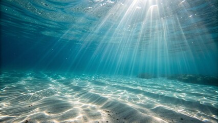Obraz premium Underwater Sunlight Streaming Through Rippling Water Surface Creating Calm Serene Scene