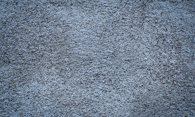 Close up of rough cement wall texture background
- Tekstur dinding semen kasar latar belakang