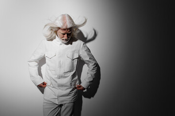 Surreal portrait of a person with white hair in a white outfit against a contrasting dark background, conveying a sense of mystery and introspection, perfect for creative projects