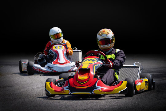 Two Go-Kart Racers on a Track, Isolated on a Dark Background - Powered by Adobe