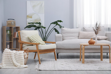 Obraz premium Comfortable armchairs and other furniture in living room. Interior design