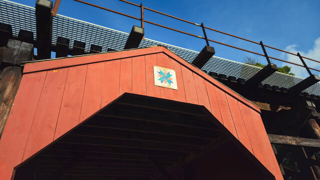 Closeup of the gable on a red covere bridge in Rothschild, Wisonsin on a summer day.