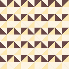 Fototapeta premium Retro geometric pattern with repeating triangles in warm cream, yellow, and brown tones
