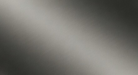 Sleek Diagonal Light Gradient on a Scratched Brushed Metal Surface