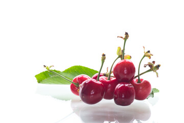 delicious red cherries on a white background