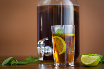 Kombucha with kombucha and mint on a rustic table