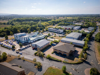 Modern industrial estate with warehouses, logistics distribution hub, business park offices and...