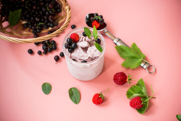 Berry ice cream with natural ingredients on background