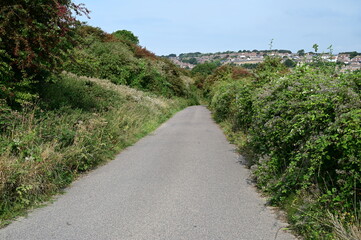 Looking down a single land country road at Newhaven in the UK. 