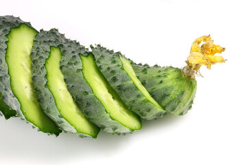 A fresh, green cucumber sliced into several pieces. 