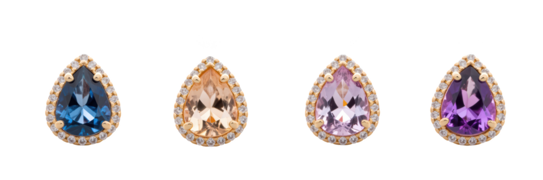 Elegant gemstone earrings featuring variety of colors including blue, peach, purple, and lavender, surrounded by sparkling accents