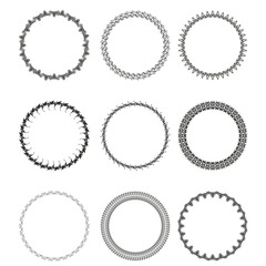 Set of 9 black round vintage vector frames on a white background.