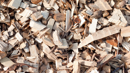 The photo shows a close-up of wood chips