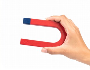 hand holding a magnet attracting concept 