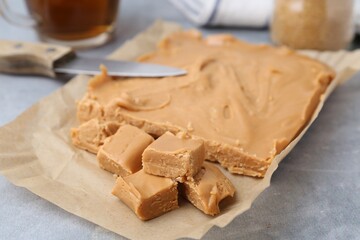 Making candies. Homemade caramel dessert on light table, closeup