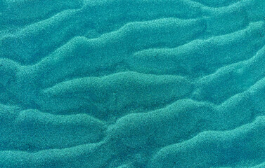 Transformative Teal abstract natural sand toned texture background for design.2026 color of the year concept.
