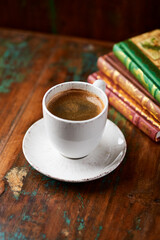 Cup of coffee on wooden background. Soft focus. Copy space	