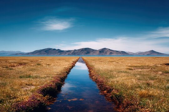Reflection of mountain range in peaceful lake landscape