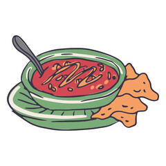 A bowl of tomato soup with crunchy tortilla chips
