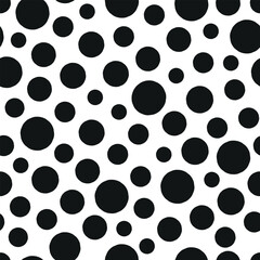 Abstract polka dot seamless pattern on a white background. 