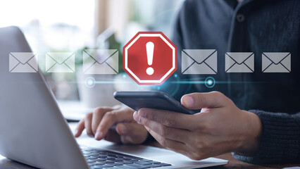 Alert! Urgent email security breach warning with smartphone and laptop, data protection concern