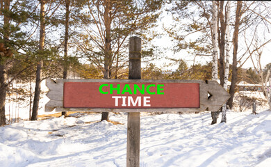 Chance time symbol. Concept word Chance time on beautiful wooden road sign. Beautiful snow winter forest background. Business chance time concept. Copy space.