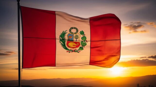 Peruvian Flag Waving at Sunset - The Peruvian flag is dramatically displayed against a vibrant sunset backdrop. The flag billows in the wind, its colors intensified by the golden hour light.