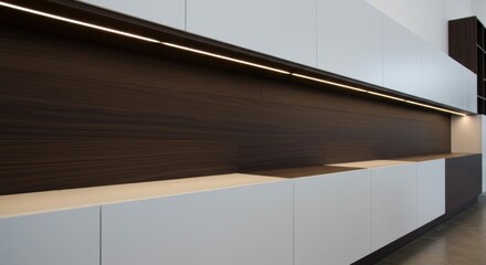 Obraz premium Modern cabinetry with dark wood paneling and led strip lighting