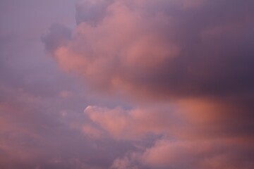 Soft pink and purple clouds fill the sky, creating a peaceful and dreamy atmosphere.
Concept of: Tranquil sky.