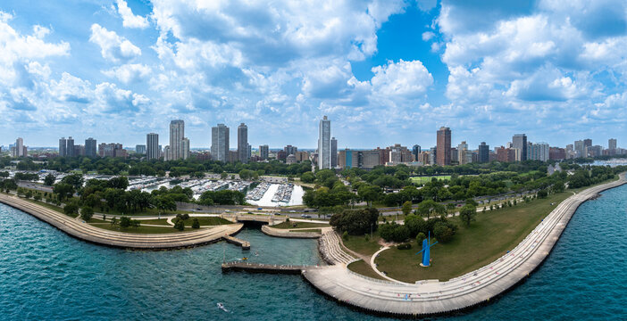 Drone Panoramic Aerial View of Diversey Harbor Chicago with Sailboats and Lake Michigan Skyline”. Panoramic drone aerial view of Diversey Harbor in Chicago, featuring sailboats docked along the lake 