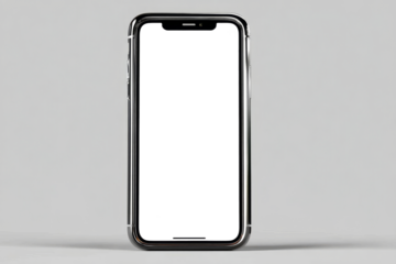 A silver iPhone is sitting on a grey surface. PNG transparency.