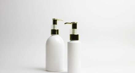 Two bottles of skin care products