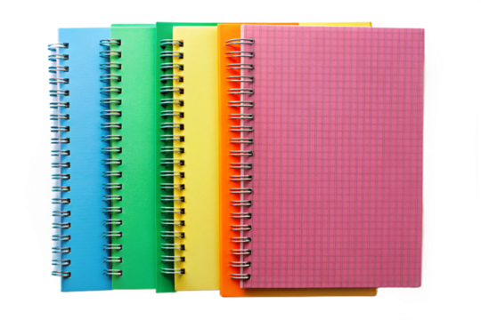 Colorful spiral bound notebooks lined up against a black background