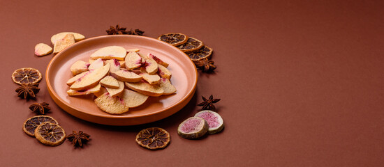 Dried sublimated slices of peach or apricot as an ingredient for sweet desserts. Dried peach