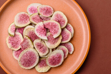 Dried sublimated fig slices as an ingredient for sweet desserts. Dried figs