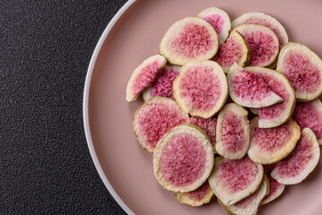 Dried sublimated fig slices as an ingredient for sweet desserts. Dried figs