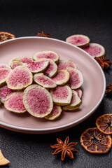 Dried sublimated fig slices as an ingredient for sweet desserts. Dried figs
