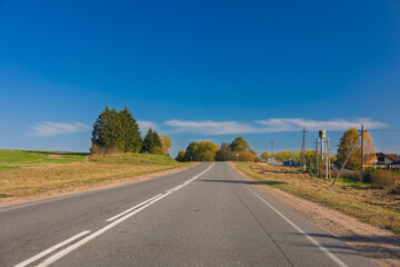 Autumn landscape, road and highway, asphalt and roadside.